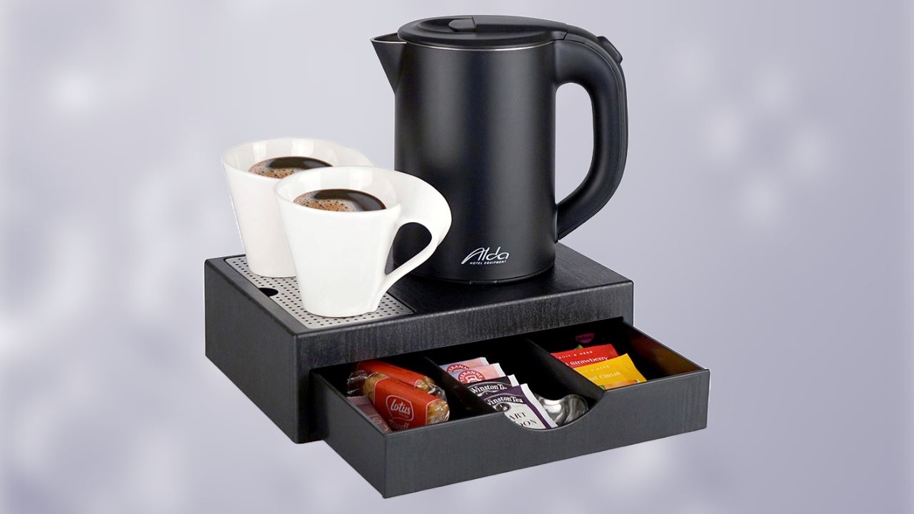 hotel room tray with kettle photo,in-room hospitality tray image,hotel amenities tray with teapot,room service tray with coffee maker,kettle tray for guest rooms,hotel beverage service image,in-room tea and coffee tray,hotel room refreshment setup,hotel equipment,hotel room amenities,welcoming tray with kettle,hospitality tray with kettle
